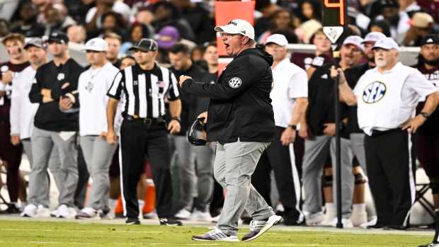 Texas A&M Aggies head coach Mike Elko reacting mid-game