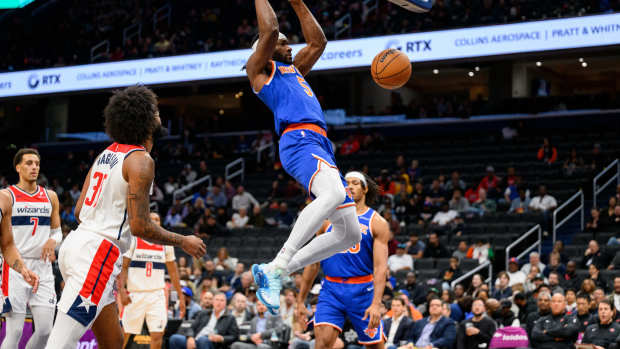 Precious Achiuwa dunking the ball during a preseason game against the Washington Wizards on October 18.