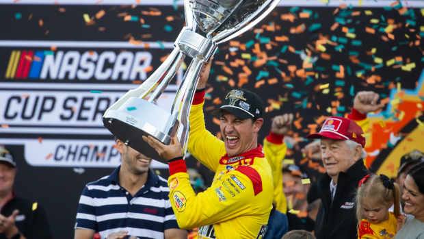 Joey Logano celebrates at Phoenix.