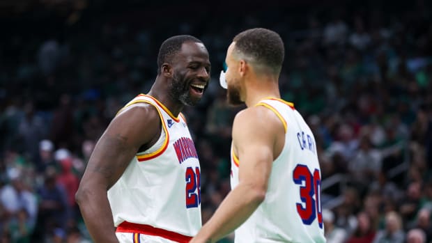 Golden State Warriors forward Draymond Green (23) and guard Stephen Curry (30).