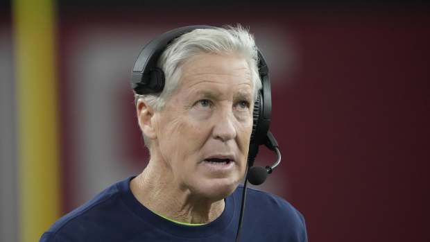 Seattle Seahawks head coach Pete Carroll looks toward the scoreboard during the third quarter against the Arizona Cardinals at State Farm Stadium in Glendale on Jan. 7, 2024.