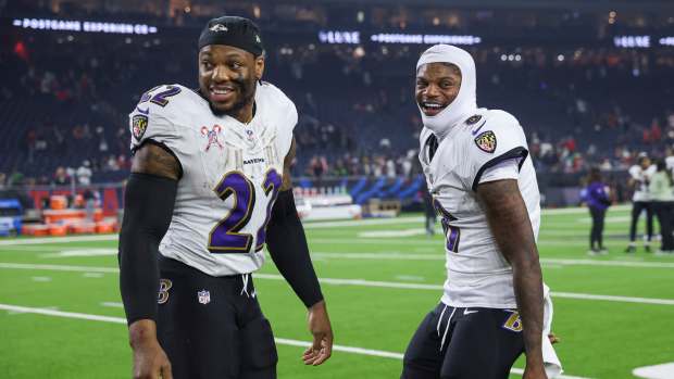 Baltimore Ravens running back Derrick Henry (left) and quarterback Lamar Jackson (right) after a game against the Houston Texans.