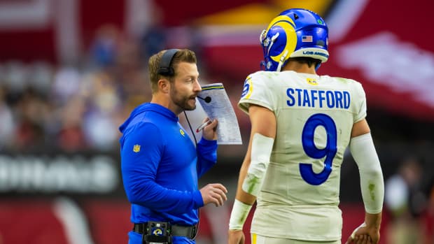 Los Angeles Rams coach Sean McVay talks with quarterback Matthew Stafford.