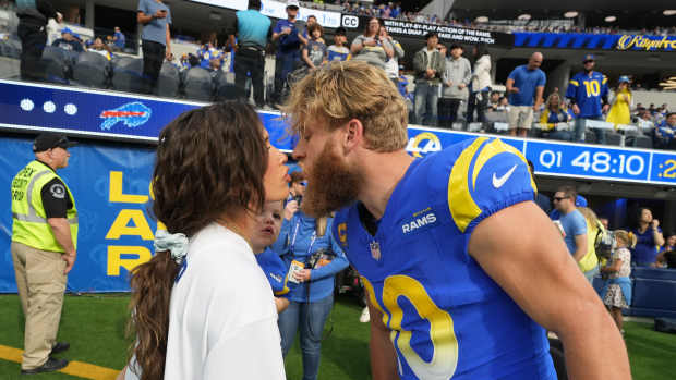 Los Angeles Rams wide receiver Cooper Kupp (10) kisses wife Anna Maria Kupp a at SoFi Stadium.