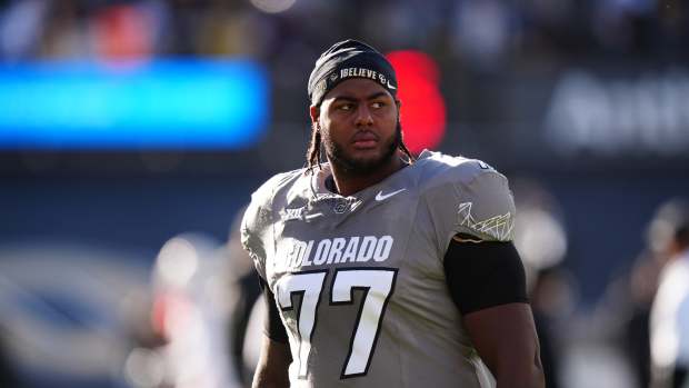 Colorado Buffaloes offensive tackle Jordan Seaton (77).