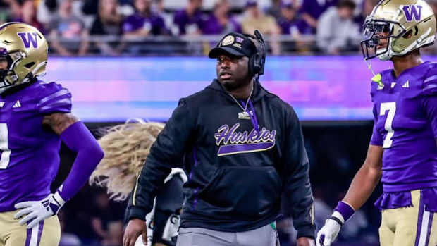 Washington assistant defensive backs coach and assistant director of recruiting Armond Hawkins Jr. on field during the 2024 season opener against Weber State.