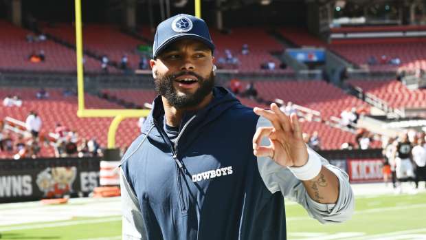 Dallas Cowboys quarterback Dak Prescott (4) runs off the field before the game between the Cleveland Browns and the Cowboys at Huntington Bank Field. Mandatory Credit: Ken Blaze-Imagn Images