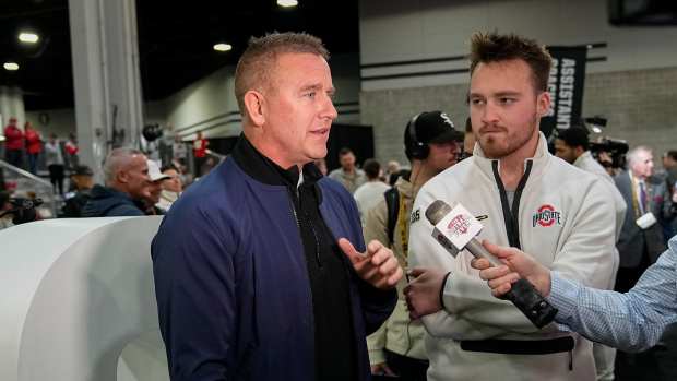 Kirk Herbstreit’s ‘Strange’ Photo With Son Chase at Michigan Visit Is Turning Heads