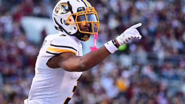 Nov 23, 2024; Starkville, Mississippi, USA; Missouri Tigers wide receiver Luther Burden III (3) reacts after a touchdown against the Mississippi State Bulldogs during the second quarter at Davis Wade Stadium at Scott Field.