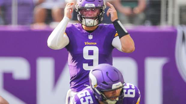 Minnesota Vikings quarterback J.J. McCarthy (9) under center against the Las Vegas Raiders in the third quarter at U.S. Bank Stadium.