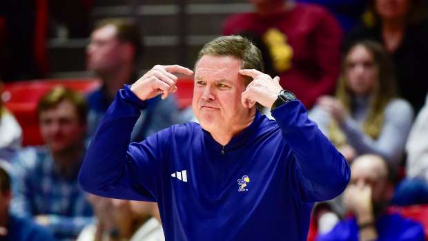 Feb 15, 2025; Salt Lake City, Utah, USA; Kansas Jayhawks head coach Bill Self calls a play against the Utah Utes during the first half at the Jon M. Huntsman Center. 