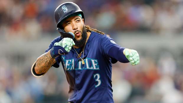 Seattle Mariners shortstop J.P. Crawford celebrates his triple against the Texas Rangers at Globe Life Field on Sept. 21, 2024.