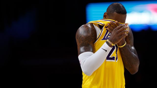 Apr 3, 2024; Washington, District of Columbia, USA; Los Angeles Lakers forward LeBron James (23) wipes his face during a stoppage in play against the Washington Wizards in the first half at Capital One Arena.