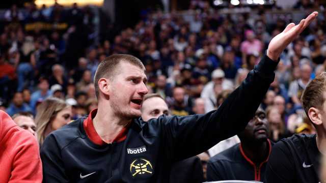 May 6, 2024; Denver, Colorado, USA; Denver Nuggets center Nikola Jokic (15) reacts from the bench in the fourth quarter against the Minnesota Timberwolves during game two of the second round for the 2024 NBA playoffs at Ball Arena.