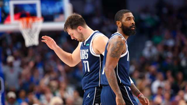 Mar 17, 2024; Dallas, Texas, USA; Dallas Mavericks guard Kyrie Irving (11) celebrates with Dallas Mavericks guard Luka Doncic (77) during the second half against the Denver Nuggets at American Airlines Center.