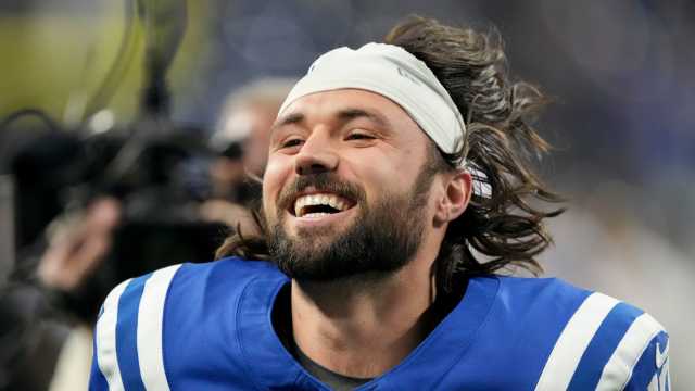 Indianapolis Colts quarterback Gardner Minshew II (10) smiles as he leaves the field Sunday, Dec. 31, 2023, after beating the Las Vegas Raiders at Lucas Oil Stadium in Indianapolis.
