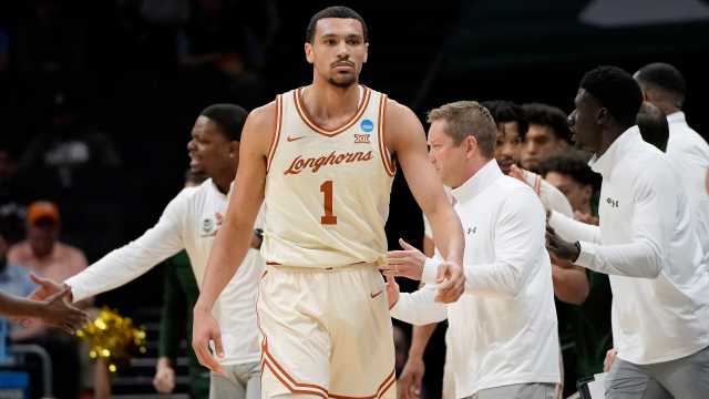 Mar 21, 2024; Charlotte, NC, USA; Texas Longhorns forward Dylan Disu (1) reacts to gameplay in the first round of the 2024 NCAA Tournament at Spectrum Center. Mandatory Credit: Bob Donnan-USA TODAY Sports 