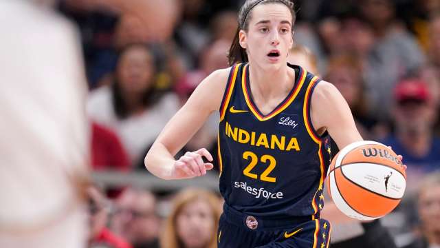 Indiana Fever guard Caitlin Clark (22) dribbles the ball down court, Thursday, May 16, 2024, during the Indiana Fever home opener game against the New York Liberty at Gainbridge Fieldhouse in Indianapolis.