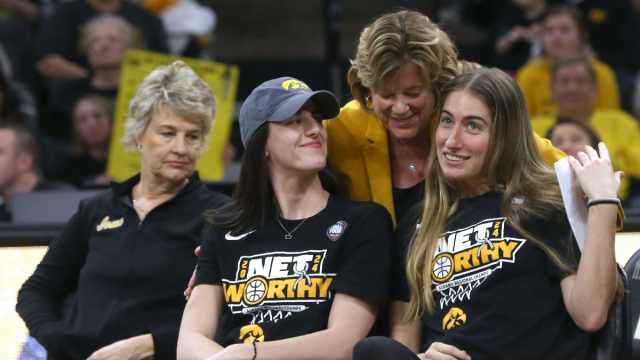 Iowa president Barbara Wilson hugs Caitlin Clark, left, and Kate Martin during a celebration of the Iowa women’s basketball team Wednesday, April 10, 2024 at Carver-Hawkeye Arena in Iowa City, Iowa.