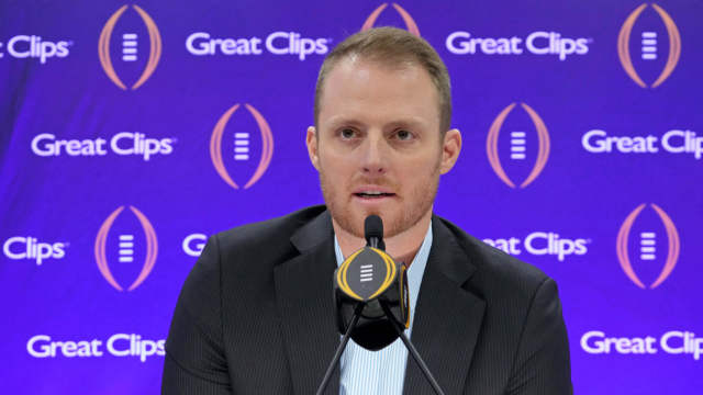 ESPN analyst Greg McElroy talks to the media during media day before the College Football Playoff national championship game against the Michigan Wolverines at George R Brown Convention Center.