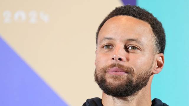 USA basketball player Stephen Curry talks to the media during a press conference.