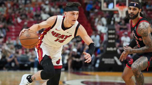 Miami Heat guard Tyler Herro drives to the basket against the Toronto Raptors at Kaseya Center on April 14, 2024.