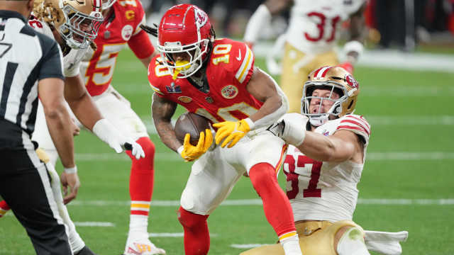 San Francisco 49ers defensive end Nick Bosa (97) tackles Kansas City Chiefs running back Isiah Pacheco.