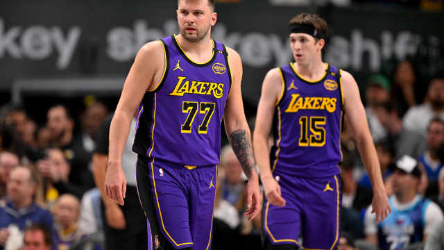 Los Angeles Lakers guards Luka Doncic (77) and Austin Reaves (15).