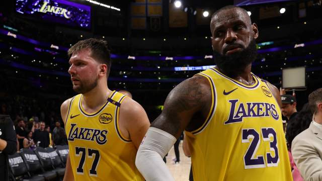 Los Angeles Lakers guard Luka Doncic (77) and Los Angeles Lakers forward LeBron James (23).