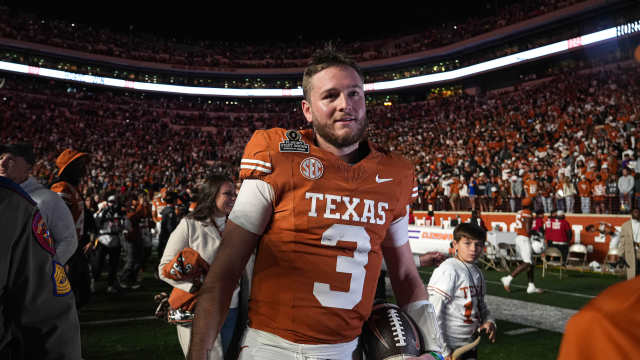 Texas Longhorns quarterback Quinn Ewers (3) leaves the field after defeating the Clemson Tigers in the first round of the College Football Playoffs at Darrell K Royal-Texas Memorial Stadium.