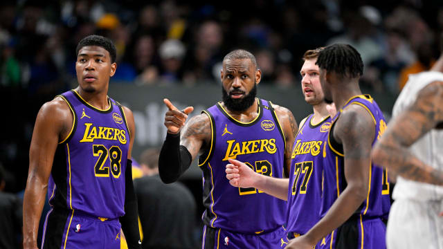 Los Angeles Lakers forward Rui Hachimura (28), forward LeBron James (23), guard Luka Doncic (77) and forward Dorian Finney-Smith (17)