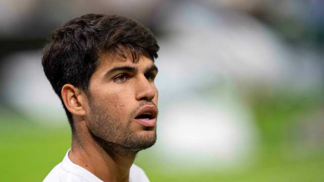 Carlos Alcaraz during his match at the All England Lawn Tennis and Croquet Club.