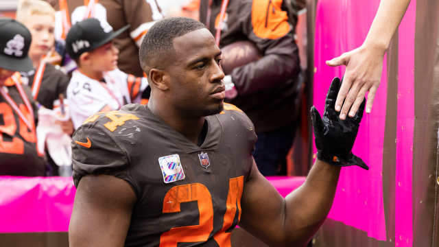 Cleveland Browns running back Nick Chubb (24) high fives fans following their loss to the Los Angeles Chargers at FirstEnergy Stadium.