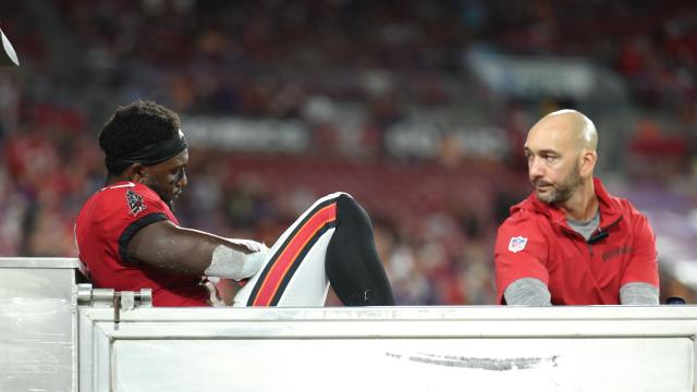 Tampa Bay Buccaneers wide receiver Chris Godwin (14) is carted off the field