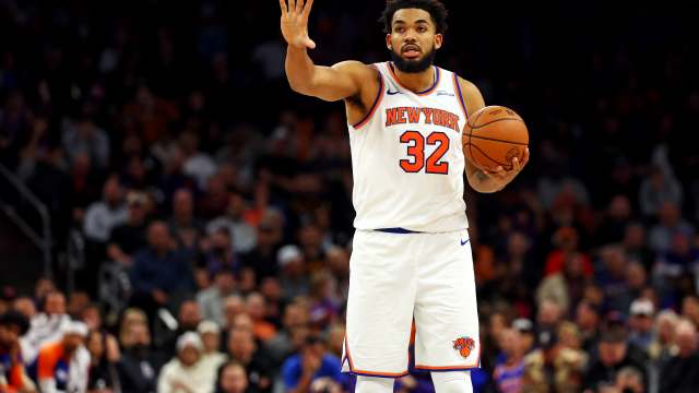 New York Knicks center Karl-Anthony Towns (32) handles the ball.