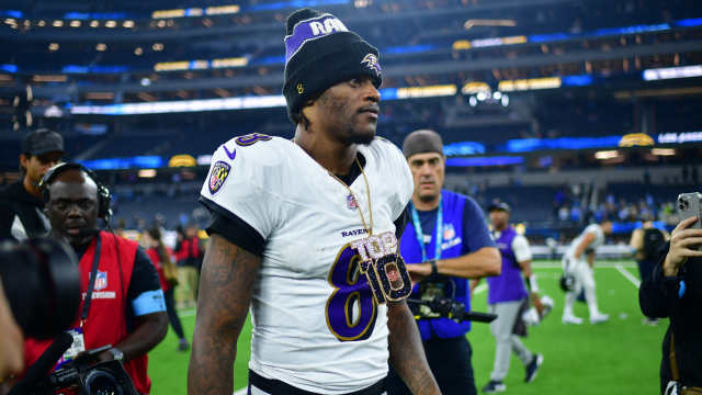 Lamar Jackson Interview Interrupted by Surprise Gift From Ravens Teammate -  Athlon Sports