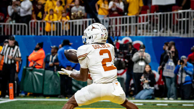 Texas Longhorns wide receiver Matthew Golden (2) catches a pass in the end zone to score during the first overtime period as the Texas Longhorns play the Arizona State Sun Devils in the Peach Bowl College Football Playoff quarterfinal at Mercedes-Benz Stadium in Atlanta, Georgia, Jan. 1, 2025.