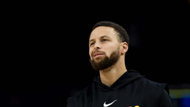 Golden State Warriors guard Stephen Curry looks on before a game against the Miami Heat.