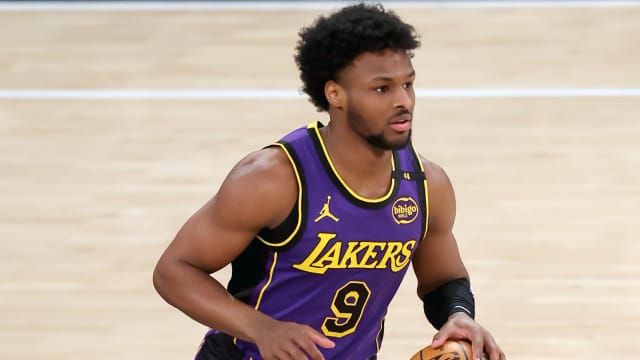 Los Angeles Lakers guard Bronny James brings the ball up court against the New York Knicks at Madison Square Garden.