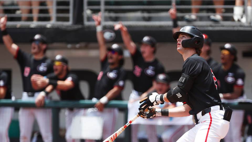 Georgia Bulldogs' Charlie Condon (24) watches the ball fly after hitting a home run during an NCAA Athens Regional baseball game against Army in Athens, Ga., on Friday, May 31, 2024. Georgia won 8-7.