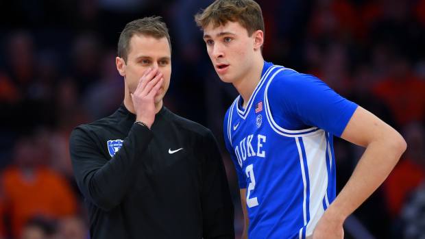 Duke Blue Devils head coach Jon Scheyer and Cooper Flagg (2).