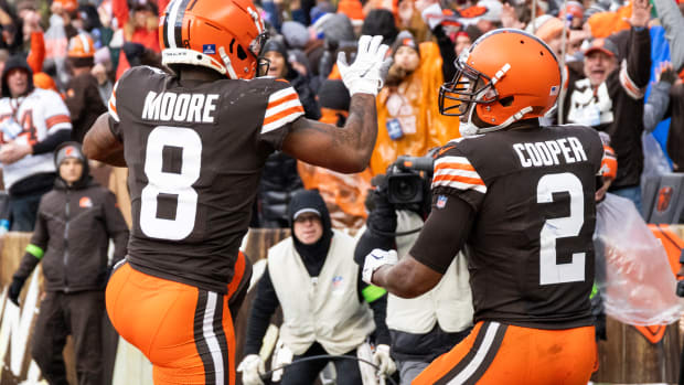 Dec 17, 2023; Cleveland, Ohio, USA; Cleveland Browns wide receiver Amari Cooper (2) celebrates his touchdown run with wide receiver Elijah Moore (8) during the fourth quarter against the Chicago Bears at Cleveland Browns Stadium. Mandatory Credit: Scott Galvin-USA TODAY Sports  