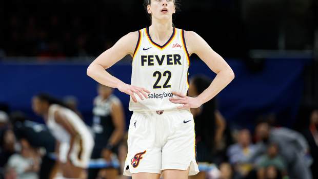 Indiana Fever guard Caitlin Clark walks onto the court during her team’s game against the Chicago Sky at Wintrust Arena on June 23, 2024.
