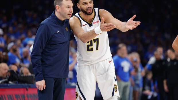 May 18, 2025; Oklahoma City, Oklahoma, USA; Denver Nuggets guard Jamal Murray (27) talks to Denver Nuggets head coach David Adelman after a play against the Oklahoma City Thunder in the second quarter during game seven of the second round for the 2025 NBA Playoffs at Paycom Center. Mandatory Credit: Alonzo Adams-Imagn Images  