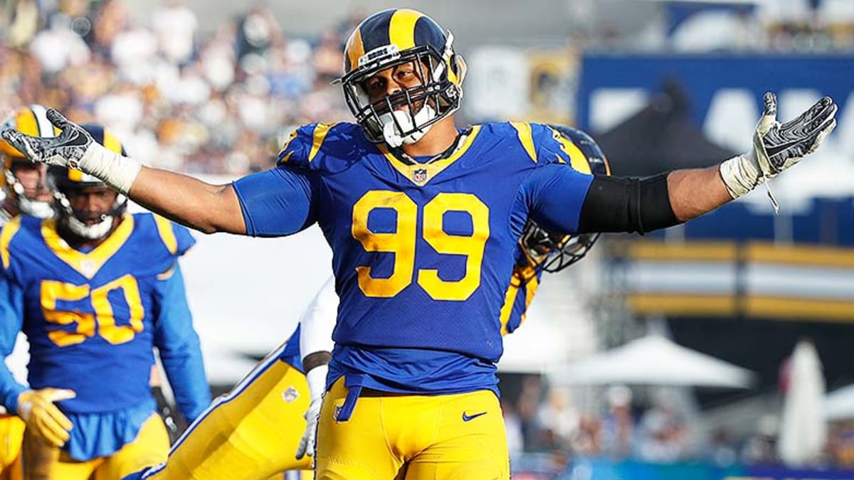 NFL on ESPN - Before he went virtually unrecruited, before he slid to the  13th pick in the loaded 2014 draft, Aaron Donald was already a Hall of  Famer to those who