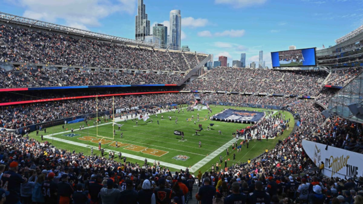 Fans hustle to get to warm after frigid Chicago Bears game at Soldier Field  on Christmas Eve