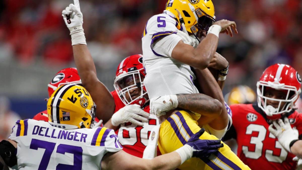 WATCH: Jalen Carter lifts LSU QB Jayden Daniels aloft with one arm to  celebrate sack