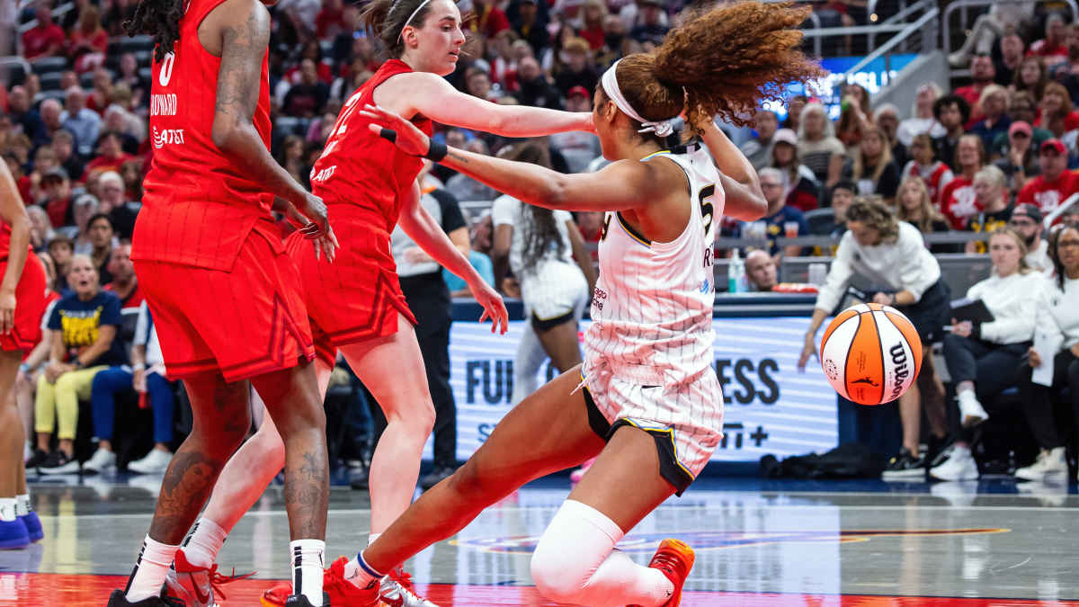 Dawn Staley Turns Heads With Opinion of Caitlin Clark-Angel Reese Controversy - Athlon Sports
