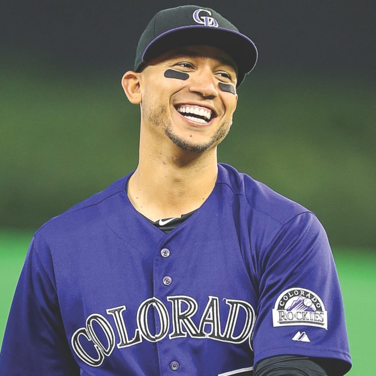 Colorado Rockies Carlos Gonzalez (L) and Troy Tulowitzki hold