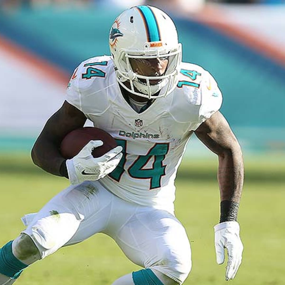 Jordan Cameron and Jarvis Landry of the Miami Dolphins react after